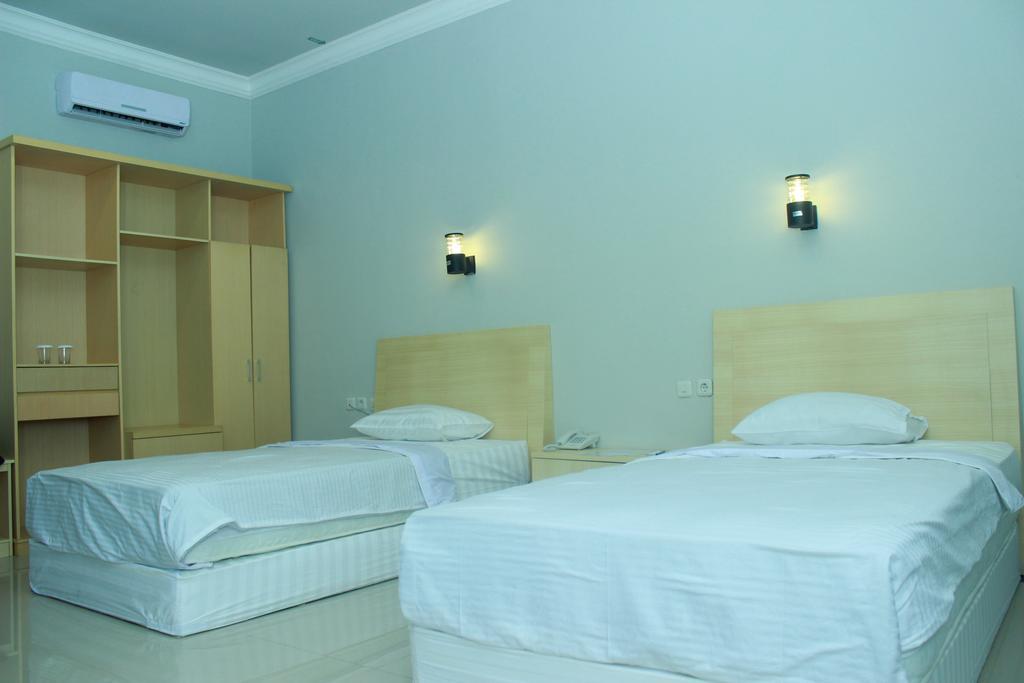 Raja Residence Jambi Джамби Номер фото